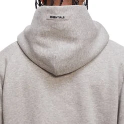 Fear Of God Essentials Heather Oatmeal Hoodie 9 Fear Of God Essentials Heather Oatmeal Hoodie -Creps Lockers Fear Of God Essentials Heather Oatmeal Hoodie Crepslocker model detail