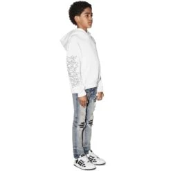Amiri Kids Bones White Hoodie 7 Amiri Kids Bones White Hoodie -Creps Lockers amiri kids bones white hoodie pf22kjl008 100 model side