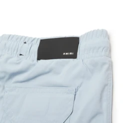 Amiri Kids MA Bar Dusty Blue Swim Trunks -Creps Lockers amiri kids ma bar dusty blue swim trunks pf22kjb002 420 back logo