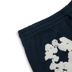 Denim Tears The Cotton Wreath Navy Sweatpants -Creps Lockers denim tears the cotton wreath navy sweatpants corner