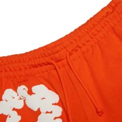 Denim Tears The Cotton Wreath Orange Sweatpants 11 Denim Tears The Cotton Wreath Orange Sweatpants -Creps Lockers denim tears the cotton wreath orange sweatpants 401 090 30 oran waist