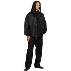 Fear Of God Essentials Arch Logo Jet Black T Shirt (SS23) -Creps Lockers fear of god essentials arch logo jet black t shirt ss23 125sp232000f model