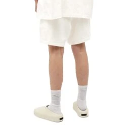 Fear Of God Essentials Cloud Dancer Shorts (FW23) -Creps Lockers fear of god essentials cloud dancer shorts fw23 model back