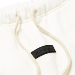 Fear Of God Essentials Cloud Dancer Sweatpants (FW23) 7 Fear Of God Essentials Cloud Dancer Sweatpants (FW23) -Creps Lockers fear of god essentials cloud dancer sweatpants logo