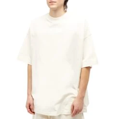 Fear Of God Essentials Cloud Dancer T Shirt (FW23) 8 Fear Of God Essentials Cloud Dancer T Shirt (FW23) -Creps Lockers fear of god essentials cloud dancer t shirt fw23 model front
