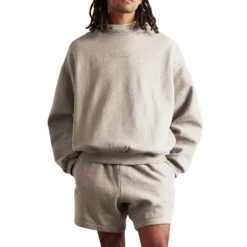 Fear Of God Essentials Core Heather Hoodie (FW23) 6 Fear Of God Essentials Core Heather Hoodie (FW23) -Creps Lockers fear of god essentials core heather hoodie fw23 model front