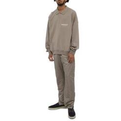 Fear Of God Essentials Desert Taupe Track Pants (FW23) -Creps Lockers fear of god essentials desert taupe track pants fw23 130bt212161f model