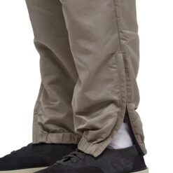 Fear Of God Essentials Desert Taupe Track Pants (FW23) -Creps Lockers fear of god essentials desert taupe track pants fw23 130bt212161f model leg
