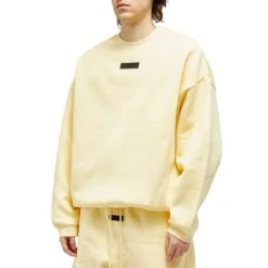 Fear Of God Essentials Garden Yellow Crewneck (FW23) 7 Fear Of God Essentials Garden Yellow Crewneck (FW23) -Creps Lockers fear of god essentials garden yellow crewneck fw23 192sp244681f model front