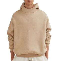 Fear Of God Essentials Gold Heather Hoodie (FW23) 6 Fear Of God Essentials Gold Heather Hoodie (FW23) -Creps Lockers fear of god essentials gold heather hoodie fw23 192bt232053f model front