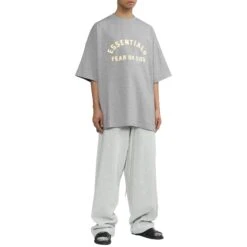 Fear Of God Essentials Heavy Jersey Crewneck Light Heather Grey T Shirt 9 Fear Of God Essentials Heavy Jersey Crewneck Light Heather Grey T Shirt -Creps Lockers fear of god essentials heavy jersey crewneck light heather grey t shirt 125sp242006f model front