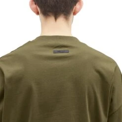 Fear Of God Essentials Jersey Crewneck Military T Shirt (FW24) 6 Fear Of God Essentials Jersey Crewneck Military T Shirt (FW24) -Creps Lockers fear of god essentials jersey crewneck military t shirt fw24 model back detail