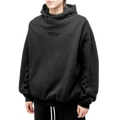 Fear Of God Essentials Jet Black Hoodie (FW23) 7 Fear Of God Essentials Jet Black Hoodie (FW23) -Creps Lockers fear of god essentials jet black hoodie fw23 model front