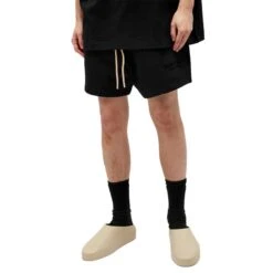 Fear Of God Essentials Jet Black Shorts (FW23) -Creps Lockers fear of god essentials jet black shorts fw23 160bt232000f mode front