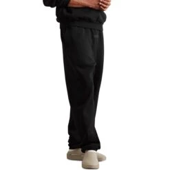 Fear Of God Essentials Jet Black Sweatpants (FW23) -Creps Lockers fear of god essentials jet black sweatpants model front