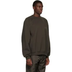 Fear Of God Essentials Off Black Sweatshirt (SS23) -Creps Lockers fear of god essentials off black sweatshirt ss23 192bt222040f model side