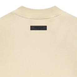 Fear Of God Essentials Relaxed Egg Shell Crewneck (FW22) 13 Fear Of God Essentials Relaxed Egg Shell Crewneck (FW22) -Creps Lockers fear of god essentials relaxed egg shell crewneck back logo