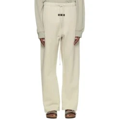 Fear Of God Essentials Relaxed Wheat Sweatpants (SS22) 8 Fear Of God Essentials Relaxed Wheat Sweatpants (SS22) -Creps Lockers fear of god essentials relaxed wheat sweatpants ss22 130bt212047f model front