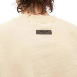 Fear Of God Essentials Sand Sweatshirt (SS23) 9 Fear Of God Essentials Sand Sweatshirt (SS23) -Creps Lockers fear of god essentials sand sweatshirt ss23 model back detail