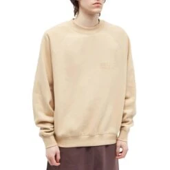 Fear Of God Essentials Sand Sweatshirt (SS23) 7 Fear Of God Essentials Sand Sweatshirt (SS23) -Creps Lockers fear of god essentials sand sweatshirt ss23 model front