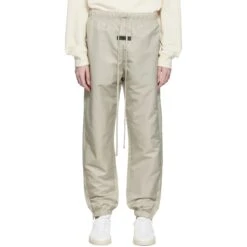 Fear Of God Essentials Smoke Track Pants (FW22) -Creps Lockers fear of god essentials smoke track pants fw22 130su222161f model front