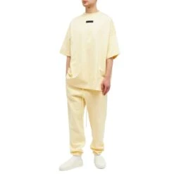 Fear Of God Essentials SS Garden Yellow T Shirt (FW23) -Creps Lockers fear of god essentials ss garden yellow t shirt fw23 125sp244191f model