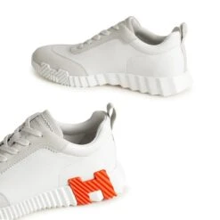 Hermès Paris Bouncing Calf Sneaker White Orange -Creps Lockers hermes paris bouncing calf sneaker white orange h221898zh94400 front side