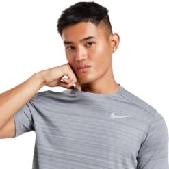 Nike Dri-FIT 1.0 Grey Miler Running T Shirt -Creps Lockers nike dri fit 1.0 grey miler running t shirt aj7565 085 model chest