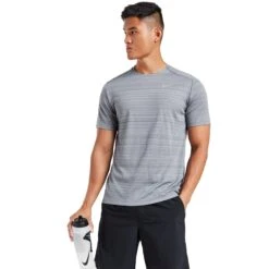 Nike Dri-FIT 1.0 Grey Miler Running T Shirt -Creps Lockers nike dri fit 1.0 grey miler running t shirt aj7565 085 model front