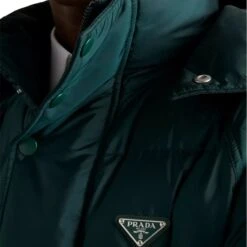 Prada Re-Nylon Plaque Cropped Green Down Jacket 9 Prada Re-Nylon Plaque Cropped Green Down Jacket -Creps Lockers prada re nylon triangle plaque cropped recycled nylon shell down jacket r04388825 Detailed