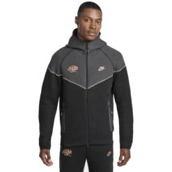 Syna World X Nike Central Cee Tech Fleece Black Hoodie 14 Syna World X Nike Central Cee Tech Fleece Black Hoodie -Creps Lockers syna world x nike central cee tech fleece black hoodie hq3748 010 model front