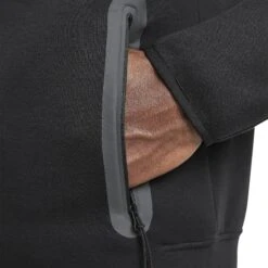 Syna World X Nike Central Cee Tech Fleece Black Hoodie 20 Syna World X Nike Central Cee Tech Fleece Black Hoodie -Creps Lockers syna world x nike central cee tech fleece black hoodie hq3748 010 model pocket detail